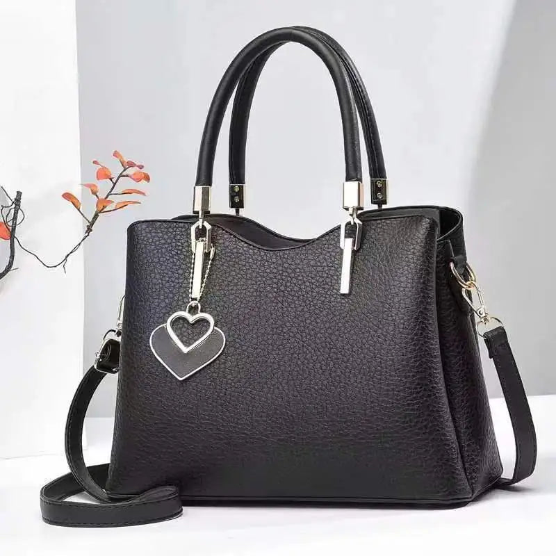 Handbag with Heart Pendant ⎜ Stylish Design and Practical Shoulder Strap