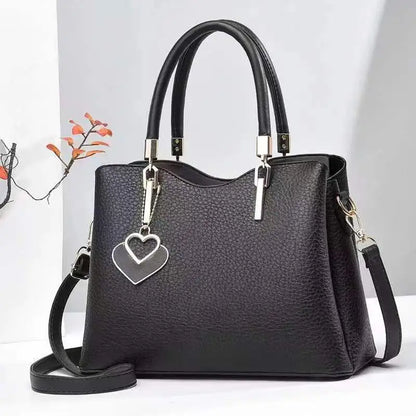 Handbag with Heart Pendant ⎜ Stylish Design and Practical Shoulder Strap