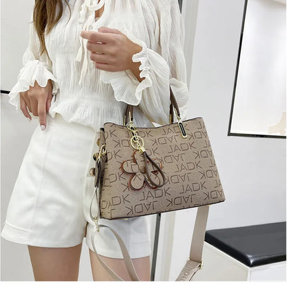 Spacious Crossbody Bag for Women ⎜ Stylish Handbag with Flower Pendant and Adjustable Shoulder Strap