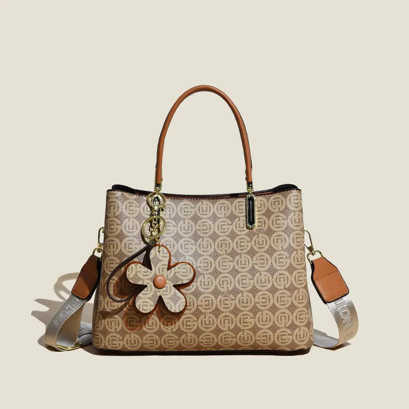 Spacious Crossbody Bag for Women ⎜ Stylish Handbag with Flower Pendant and Adjustable Shoulder Strap