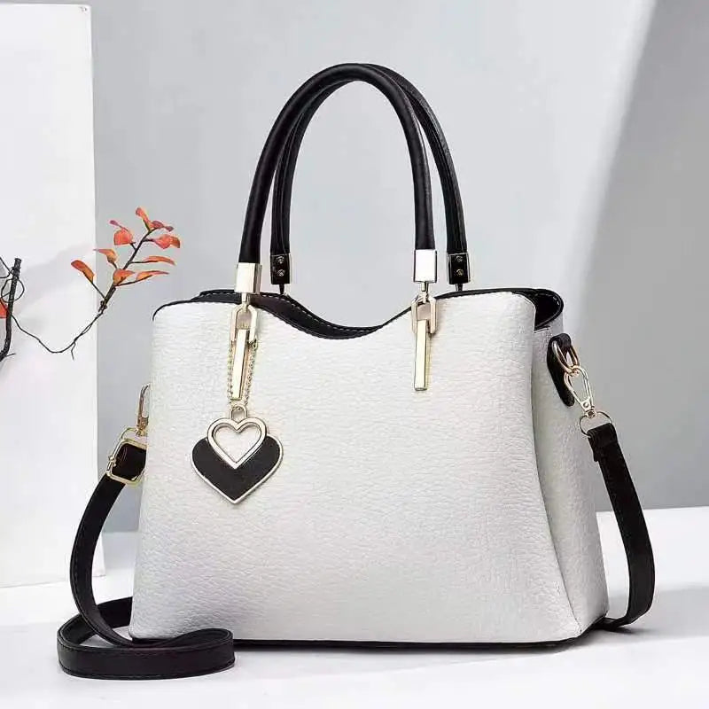 Handbag with Heart Pendant ⎜ Stylish Design and Practical Shoulder Strap