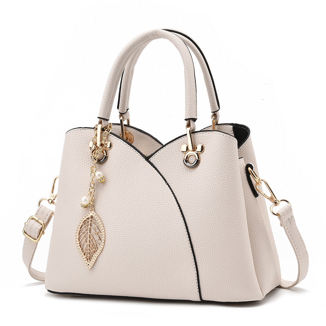 Elegant Handbag for Women ⎜ Stylish Shoulder Bag with Leaf Pendant and Practical Design