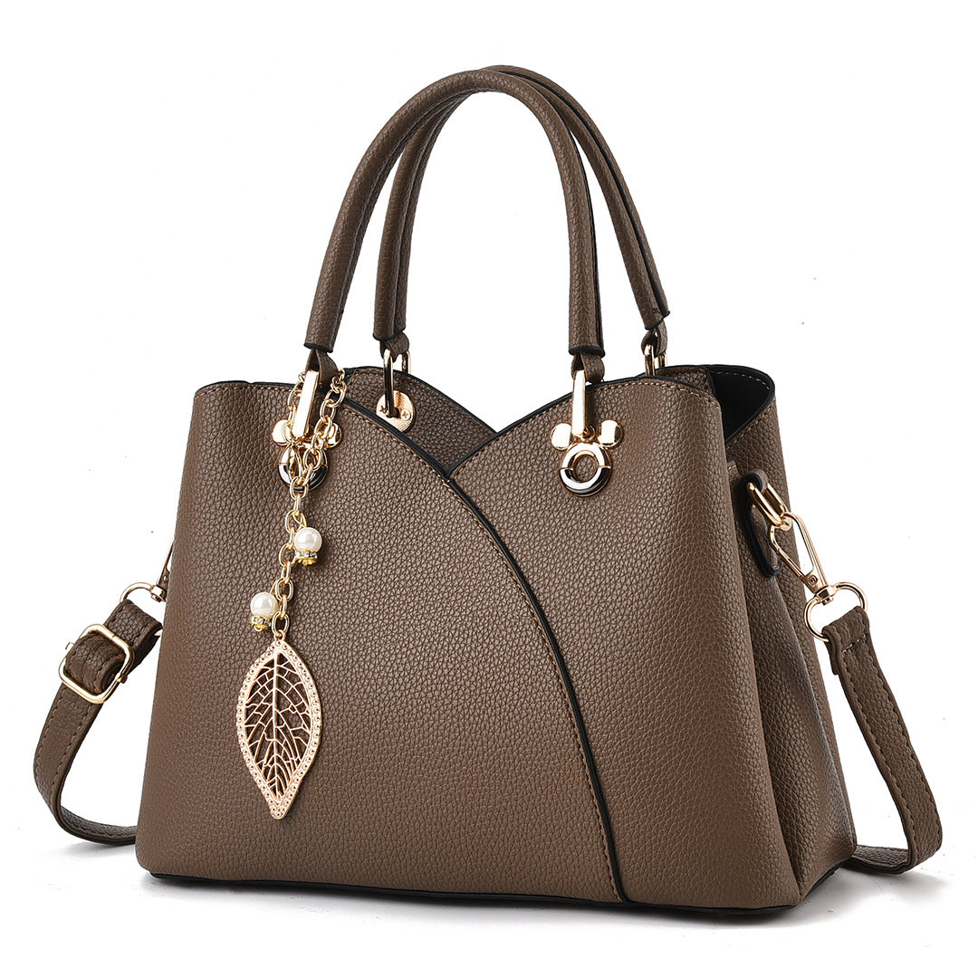 Elegant Handbag for Women ⎜ Stylish Shoulder Bag with Leaf Pendant and Practical Design