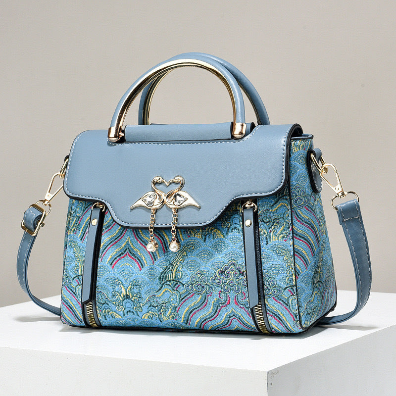 Elegant Handbag for Women ⎜ Fashionable Shoulder Bag with High - Quality Embroidery and Heart Pendant