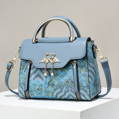 Elegant Handbag for Women ⎜ Fashionable Shoulder Bag with High - Quality Embroidery and Heart Pendant