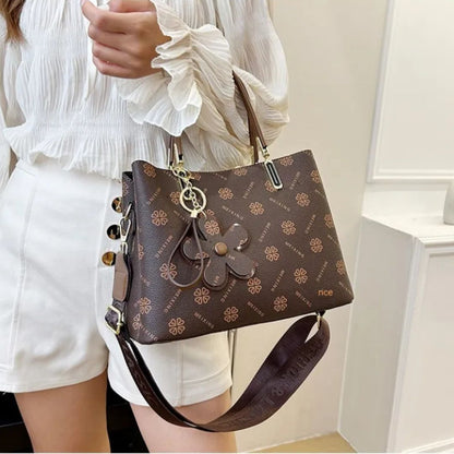 Spacious Crossbody Bag for Women ⎜ Stylish Handbag with Flower Pendant and Adjustable Shoulder Strap